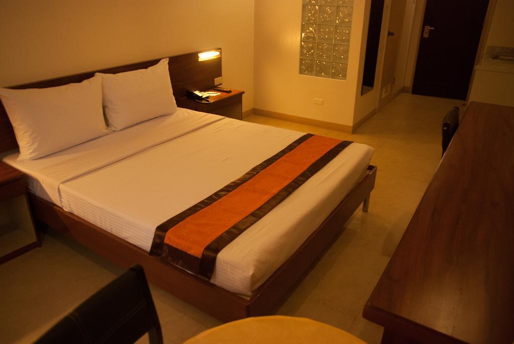 M Suites Hotel Makati City Habitación foto
